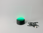 Edge-lit LED acrylic nightlight with round base turned off, showing clean white laser engraved design